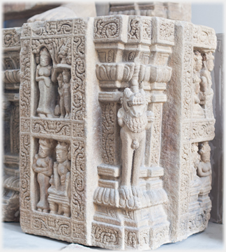 Hindu carving on dias.
