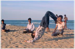 Young men breakdancing.