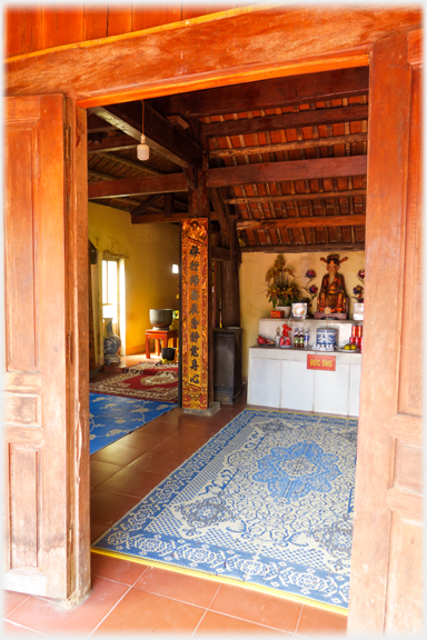 Looking through doorway into pagoda.