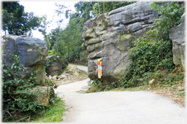 Road passing between two boulders.