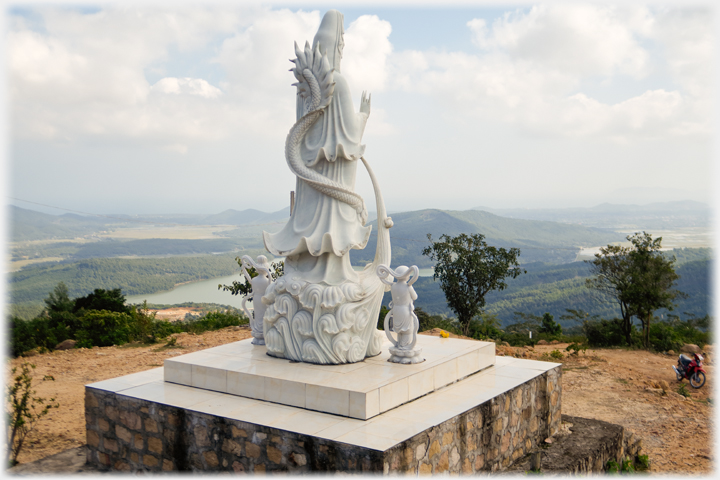 Buddha statue and landscape.