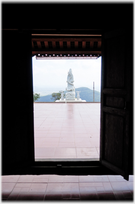 Doorway view of statue.