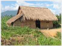 Small roadside thatched house.