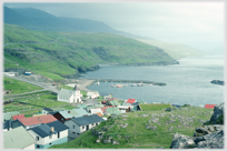 Eidi church and harbour in the north of the Faroes.