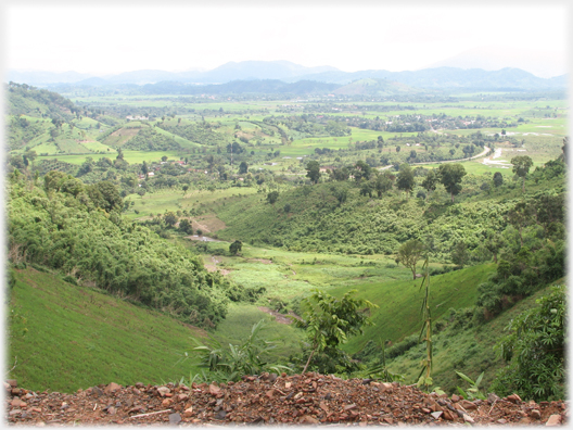 View of wide valley with fields.