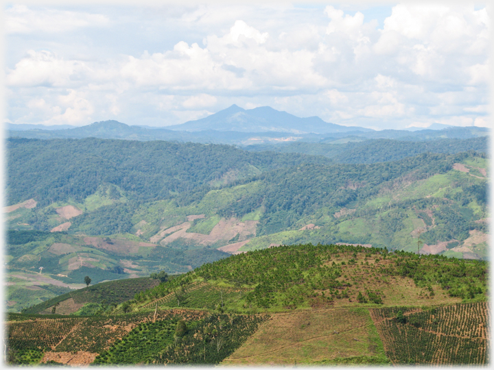 Wide view across country to distant mountains.