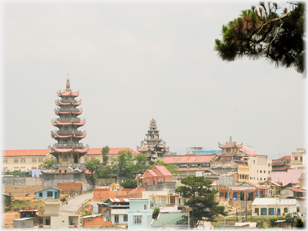 View across the town of the main comples with the seven story bell tower to the left.