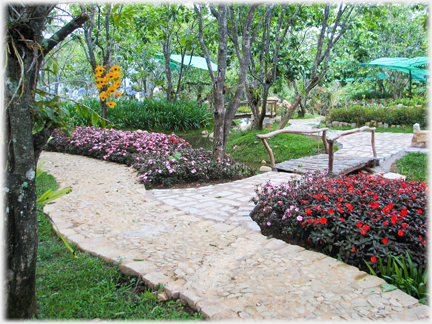 Paths between flower beds.