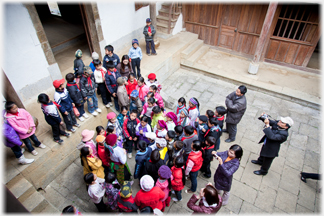 School party being photographed.