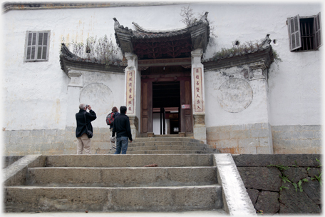 Visitors going in the main door.