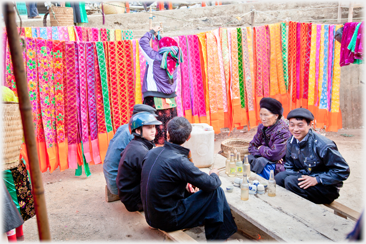 Colourful embroidery as drinking backdrop.