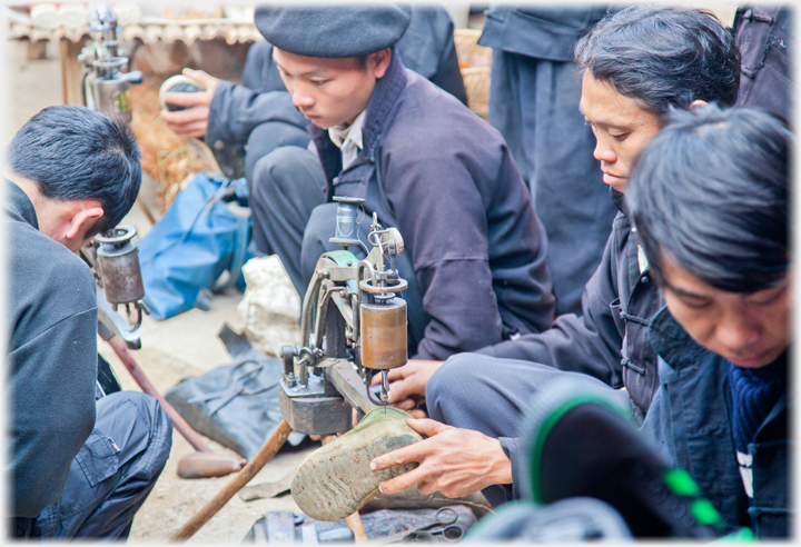 Cobblers and their sewing machines.