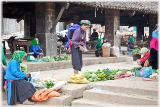 Spreying vegetables to keep them fresh.