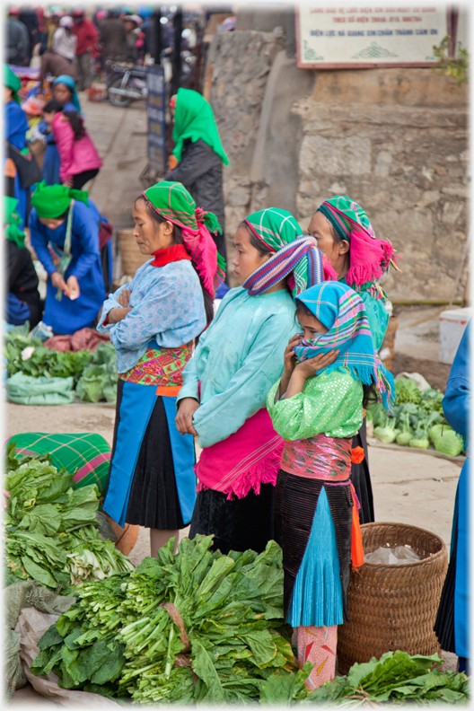 Four women standing.