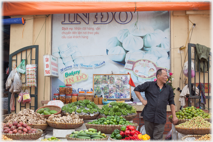 Vegetable stall holder.