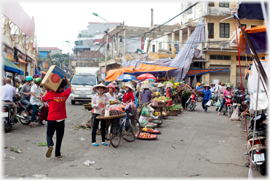 Man carrying box.