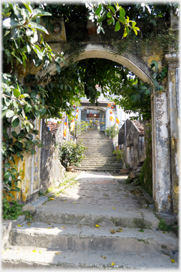 Looking up at the flights of steps ahead.