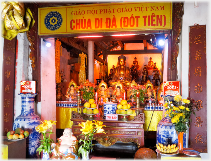 Inner shrine with many figures.