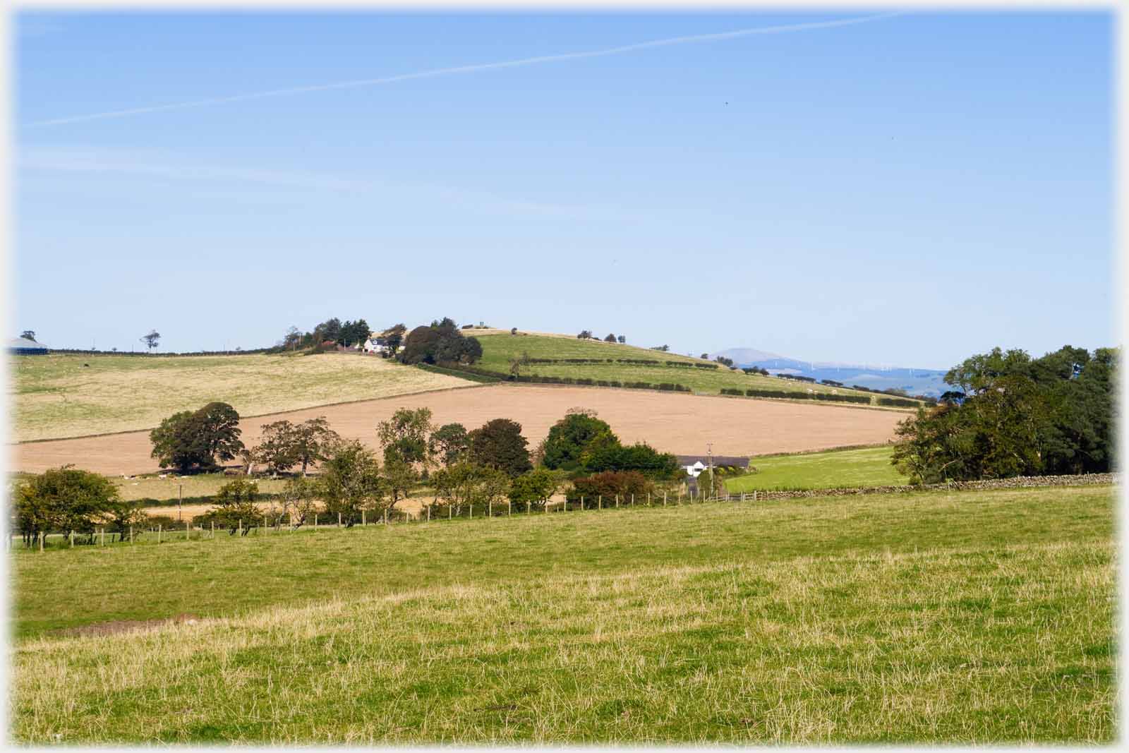 Gently undulating farm land.