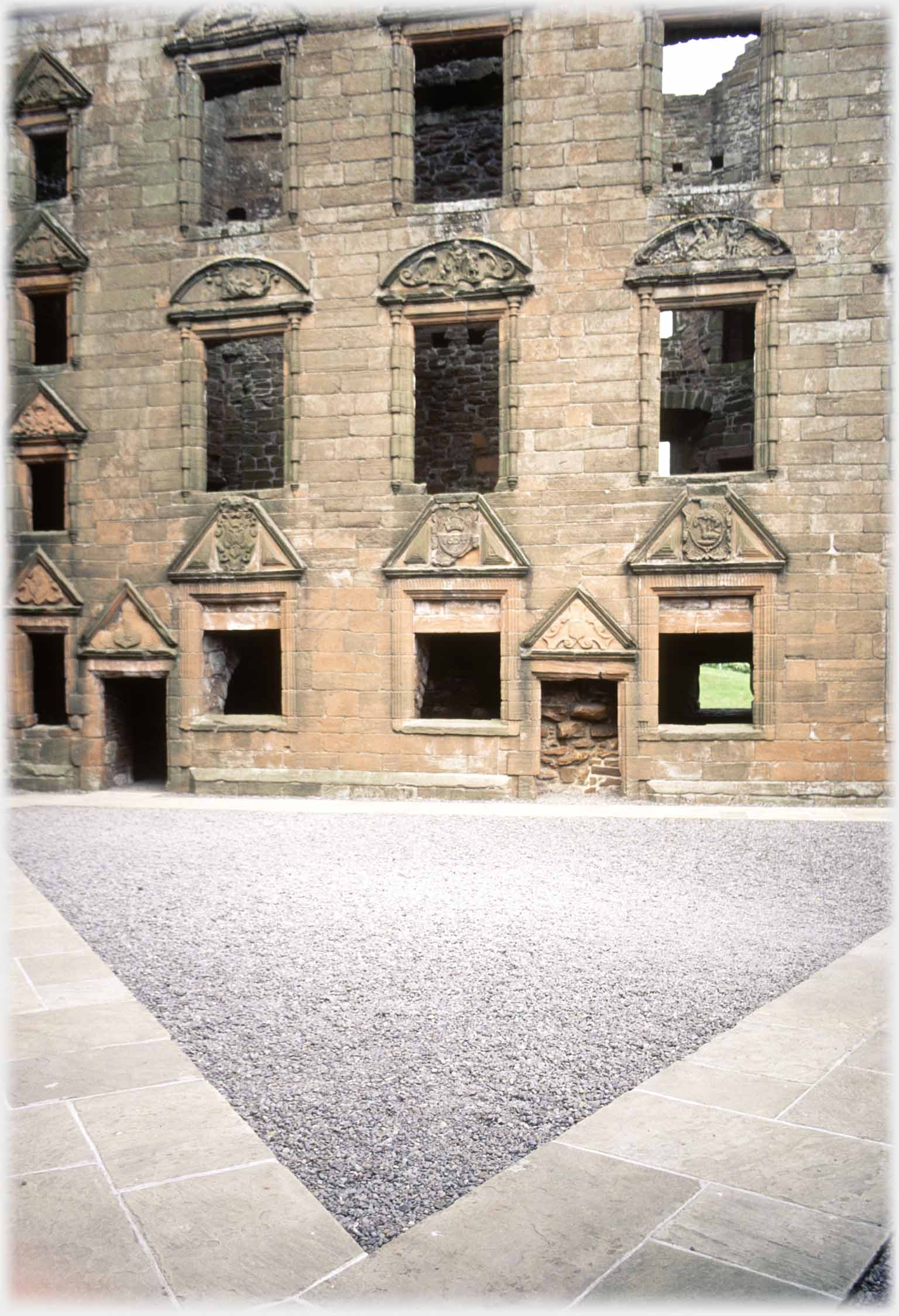 Wall with many window holes.