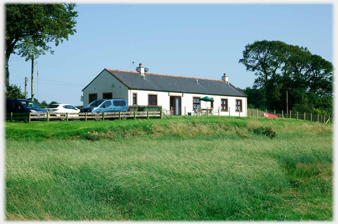 White single story house.