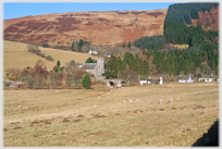 Church with hills behind.