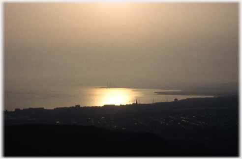 Part of further coast line visible.