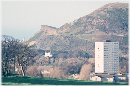 Tower block backed by the Salisbury Crags.