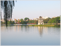 Lake with monument on island.