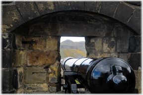 View through loop over cannon to Athur's Seat.