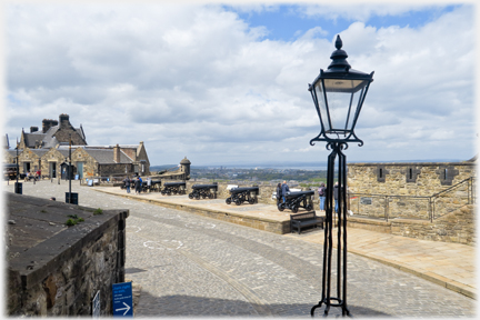 Lampost and line of cannons.