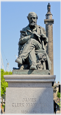 Seated figure with column behind.