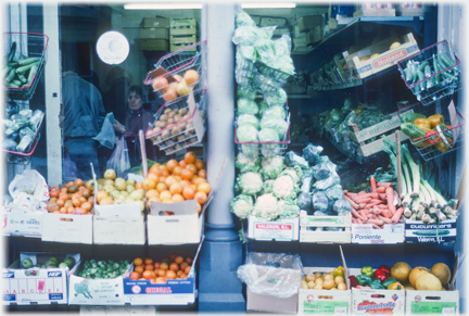 Fruit and veg display outside shop.