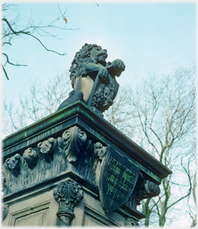 Gatepost with heraldic lion.