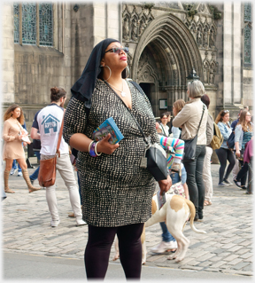 Statuesque woman standing.