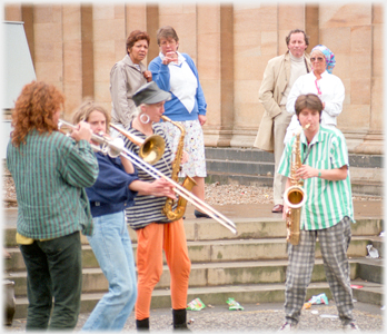 Four women brass players.