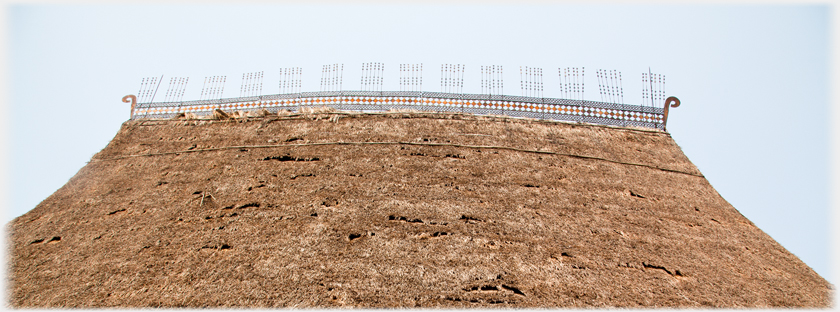 Ridge decoration on the roof of the Ba Na house.