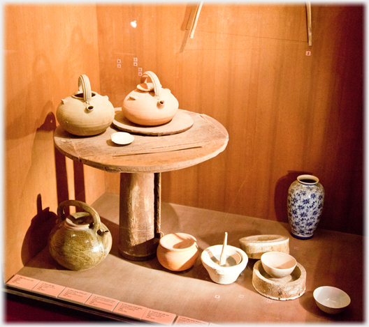Display of teapots and cups.