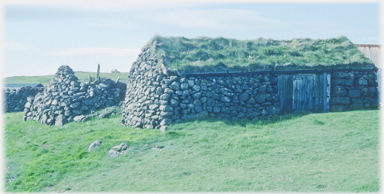 Trufed roof barn.