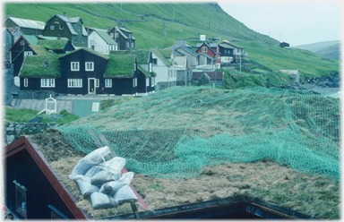 Nets and sandbags on roof.
