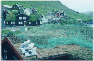 Nets and sandbags on roof.