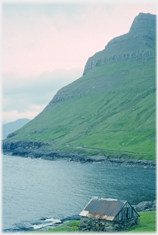 Hut and hillside.