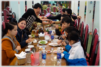 Large group at meal.