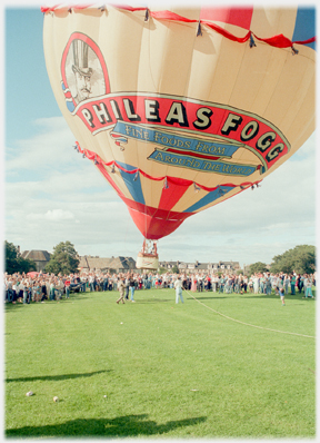 Philias Fogg balloon lifting off.
