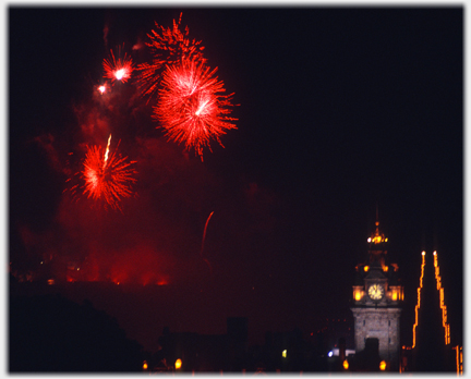 Red fire bursts and North British Hotel.