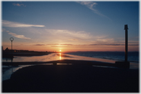 Setting sun along the beach at Portobello.