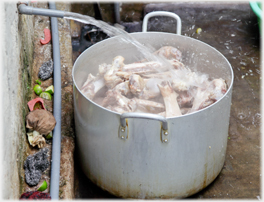 Water added to a pot of bones.
