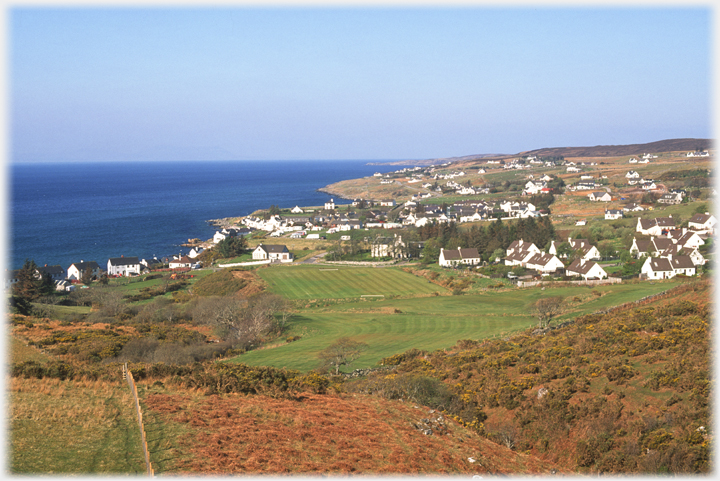 The village of Gairloch spread along the shoreline.