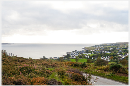A grey dull view of Gairloch and the village.