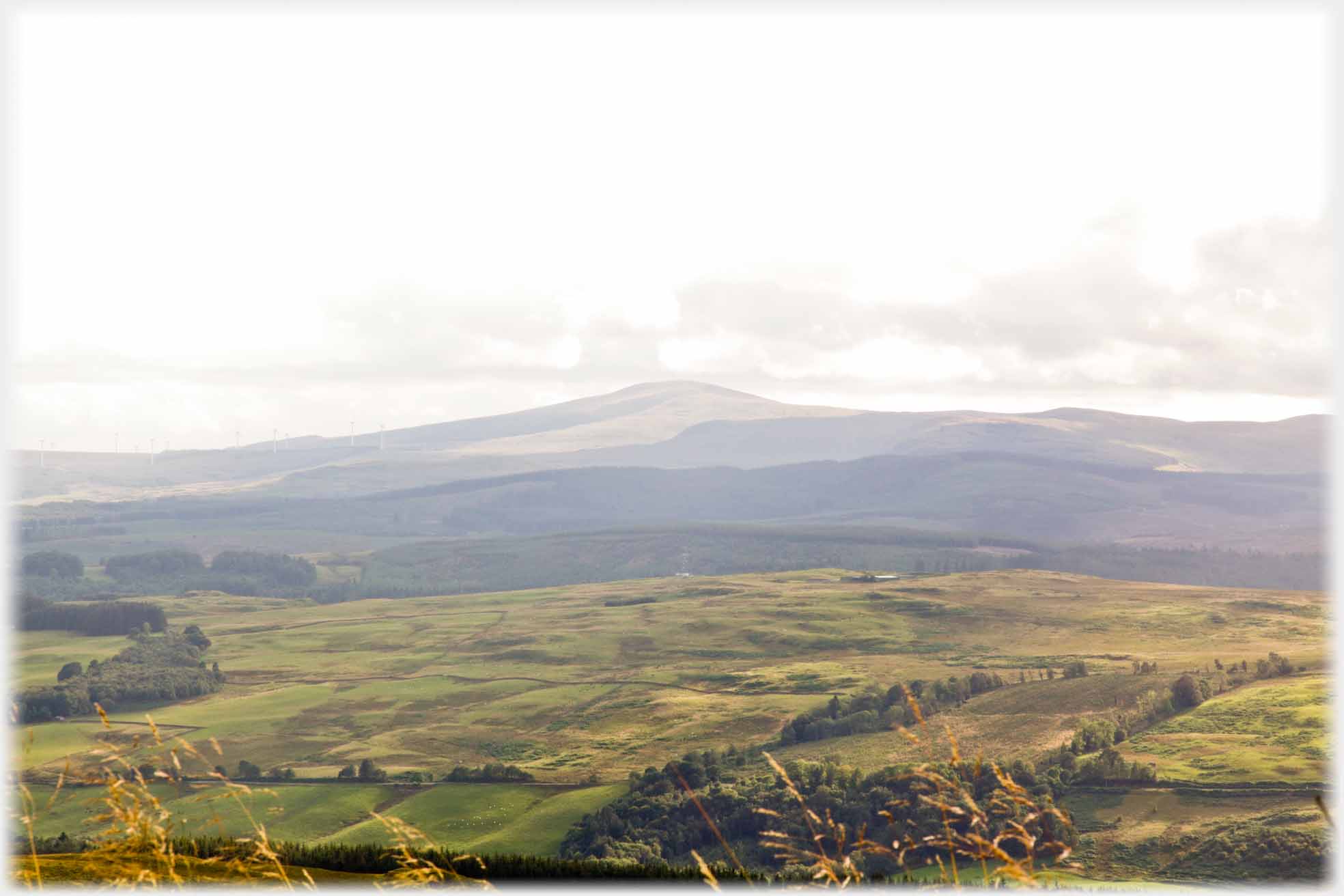Distant conical hill in evening light.